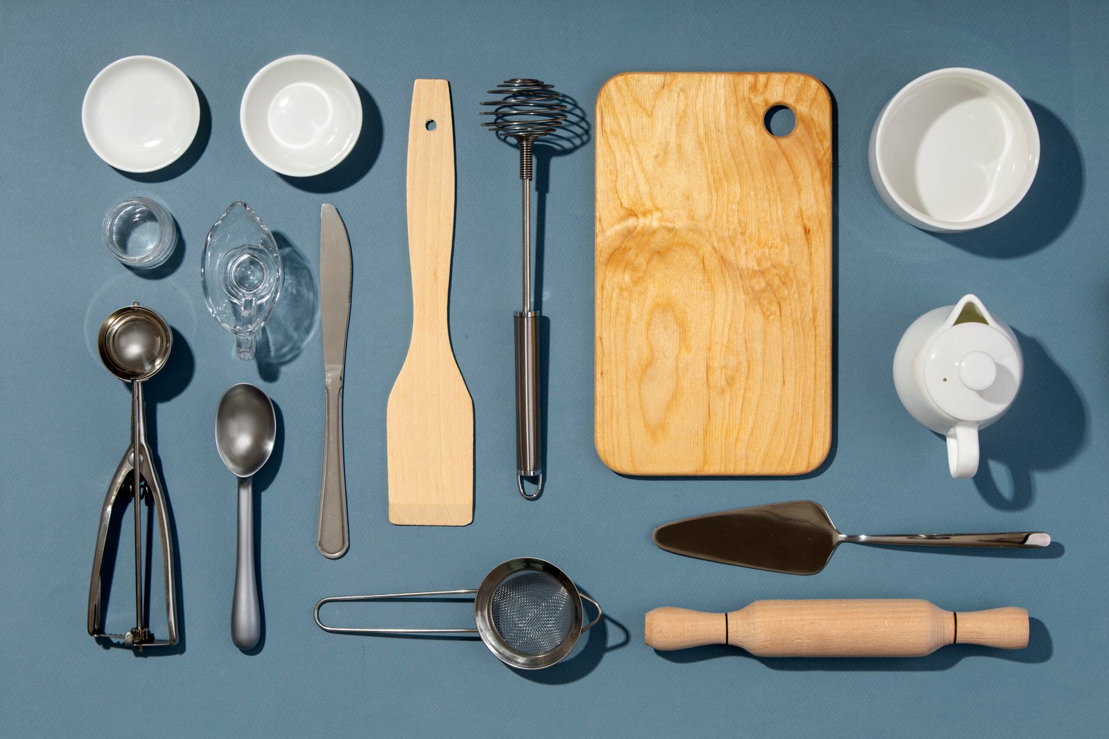 supplies-composition-with-blue-background-flat-lay